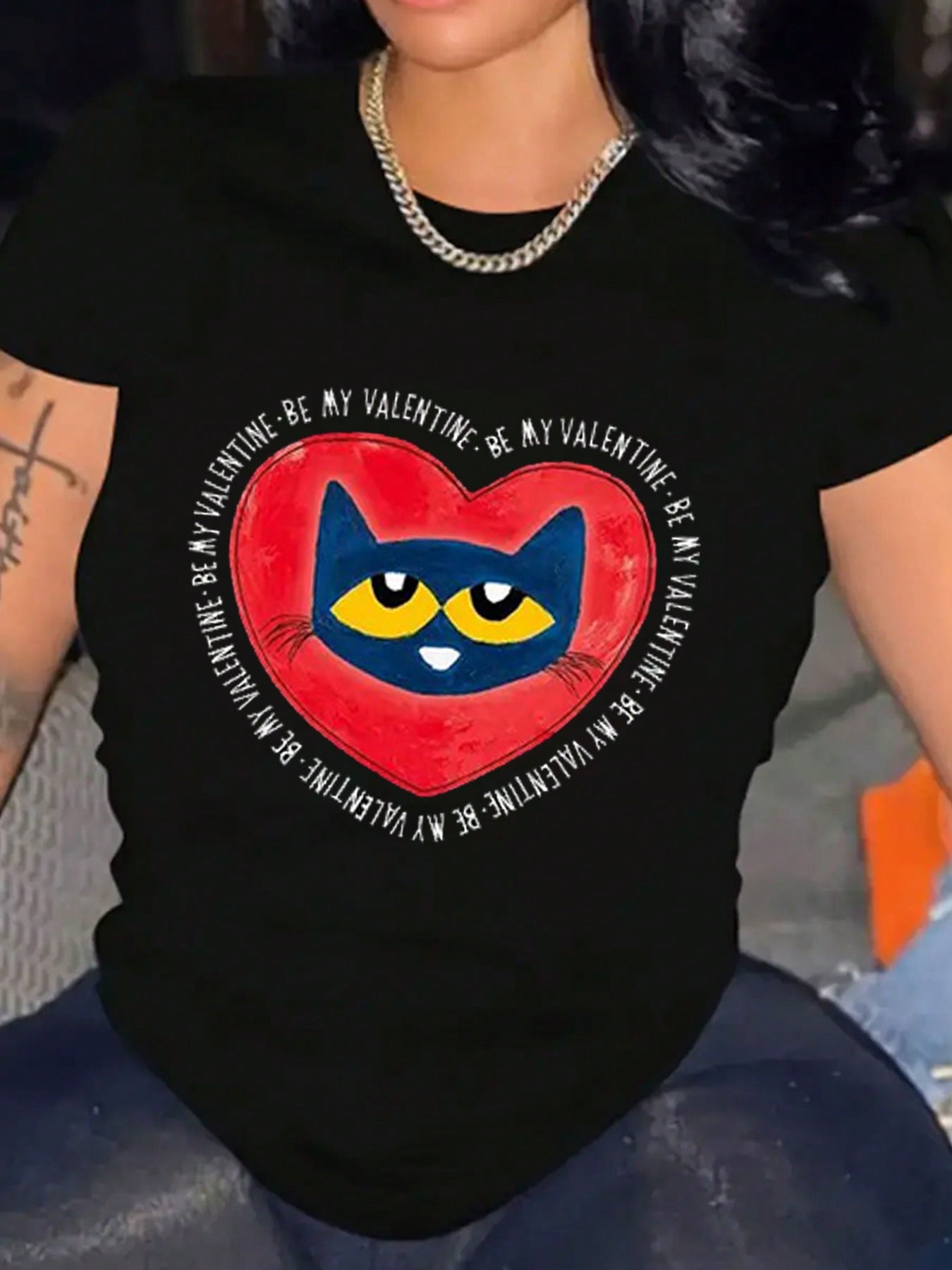 Show off your love for felines with our Charming Valentine's Cat Graphic Tee! Made of soft cotton, this crew neck tee is perfect for cat lovers everywhere. With a cute and playful design, this tee is sure to bring a smile to your face (and everyone else's). Meow!