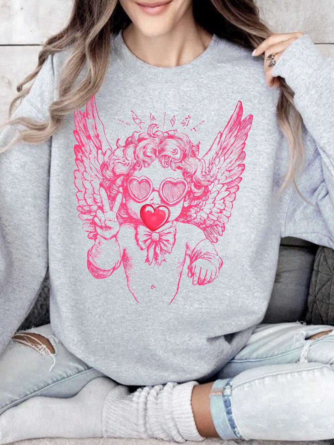Spread some love this Valentine's Day with our Charming Sweatshirt! Made with every stitch filled with cozy love, this sweatshirt is perfect for a romantic evening or a casual day out. Express your affection in style with our quirky and comfortable sweatshirt!