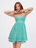 Step into sunny days with this Charming Western Floral Gingham Mini Dress. Featuring delicate spaghetti straps and a playful bow detail, it’s the perfect pick for spring and summer getaways. Light and breezy, this dress combines classic gingham with a fresh floral twist, making every moment feel like a fun adventure. Whether you’re strolling through a farmers’ market or enjoying a beachside café, this mini dress adds a flirty, carefree vibe to your vacation wardrobe.