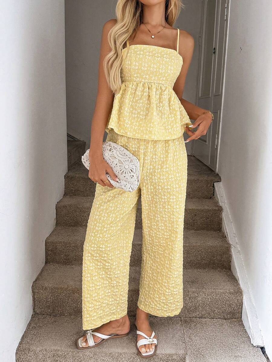 Escape to island vibes with this cheerful yellow ditsy floral two-piece set! Featuring a breezy crop top and matching shorts, this playful ensemble captures the carefree spirit of tropical getaways. The vibrant floral print brings sunshine to your wardrobe, while the comfortable fit keeps you cool and confident all day long. Whether you're lounging by the pool, exploring a beach town, or soaking up vacation memories, this set delivers effortless style with a fun, summery flair. Your next Hawaiian adventure 