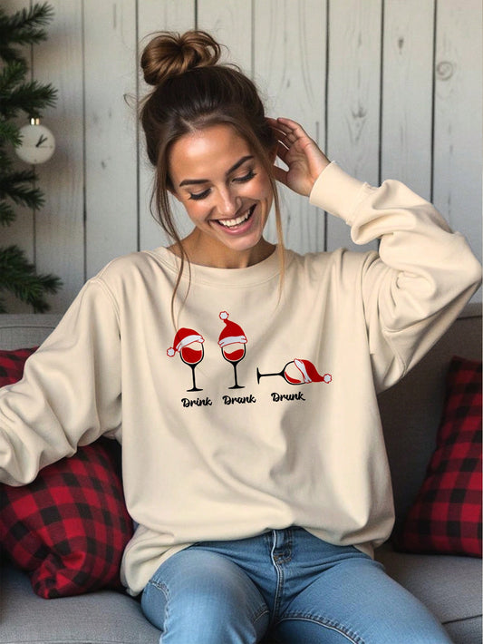 Stay festive and cozy this holiday season with our Cheers to the Season sweatshirt. Made with soft and warm fabric, this sweatshirt features a playful 'Drink Drank Drunk' design that will surely bring a smile to your face. Perfect for any holiday party or night in, spread some cheer and get yours today!