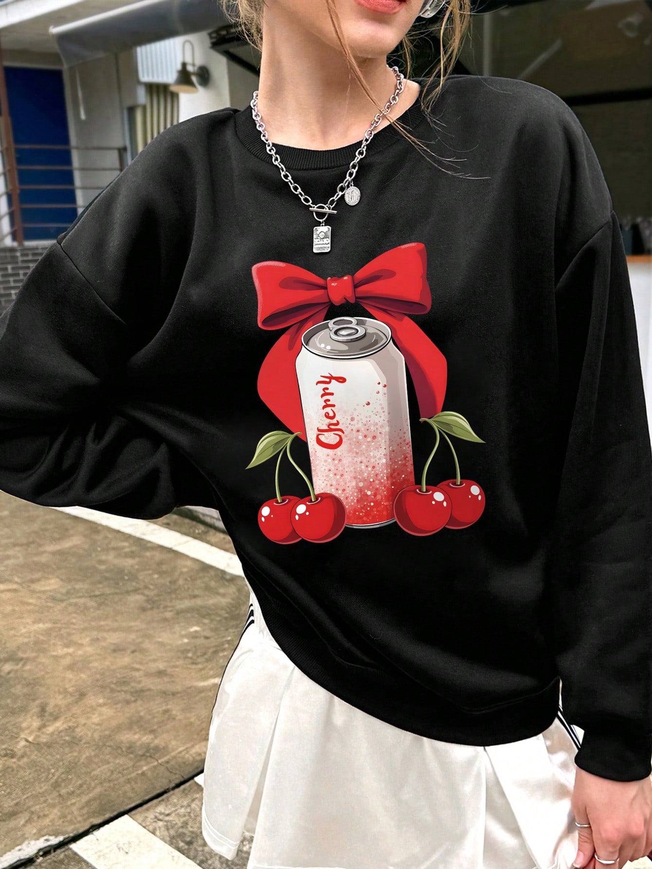 Enhance your casual look with our Cherry Delight: Bow Print Sweatshirt. With an adorable bow print, this sweatshirt exudes a sweet and playful vibe. Made with high-quality fabric, you can enjoy both style and comfort. Perfect for any casual occasion, this sweatshirt will surely be your new favorite.