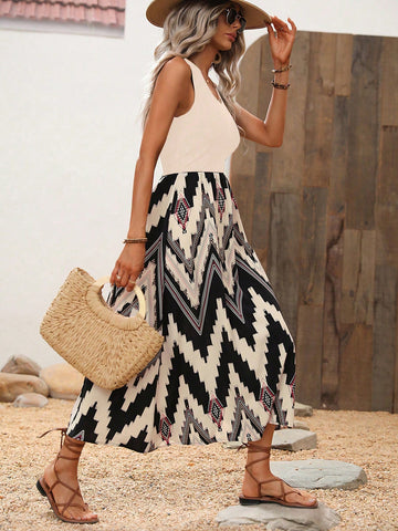 Introducing Chevron Chic: The A-Line Maxi Dress for Effortless Beachside Elegance. This dress combines the classic chevron pattern with a flattering A-line silhouette, making it perfect for a day at the beach or a night out. Elegance has never been this effortless (or chic)!