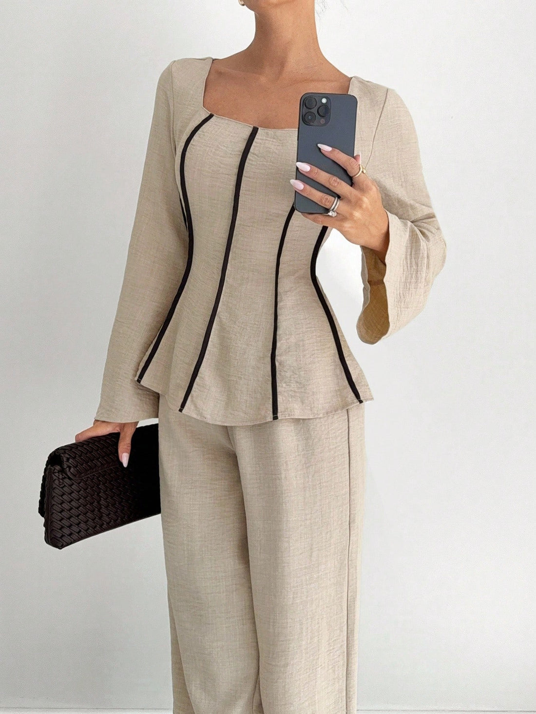 Elevate your seasonal wardrobe with this stunning 2-piece set that effortlessly blends comfort and style. Featuring eye-catching flare sleeves and chic contrast trim detailing, this ensemble is your go-to for those crisp autumn and cozy winter days. The playful silhouette adds movement and personality to any outfit, while the coordinated pieces work beautifully together or separately for maximum versatility. Perfect for layering or wearing solo, this set brings that coveted relaxed-chic vibe to your everyda