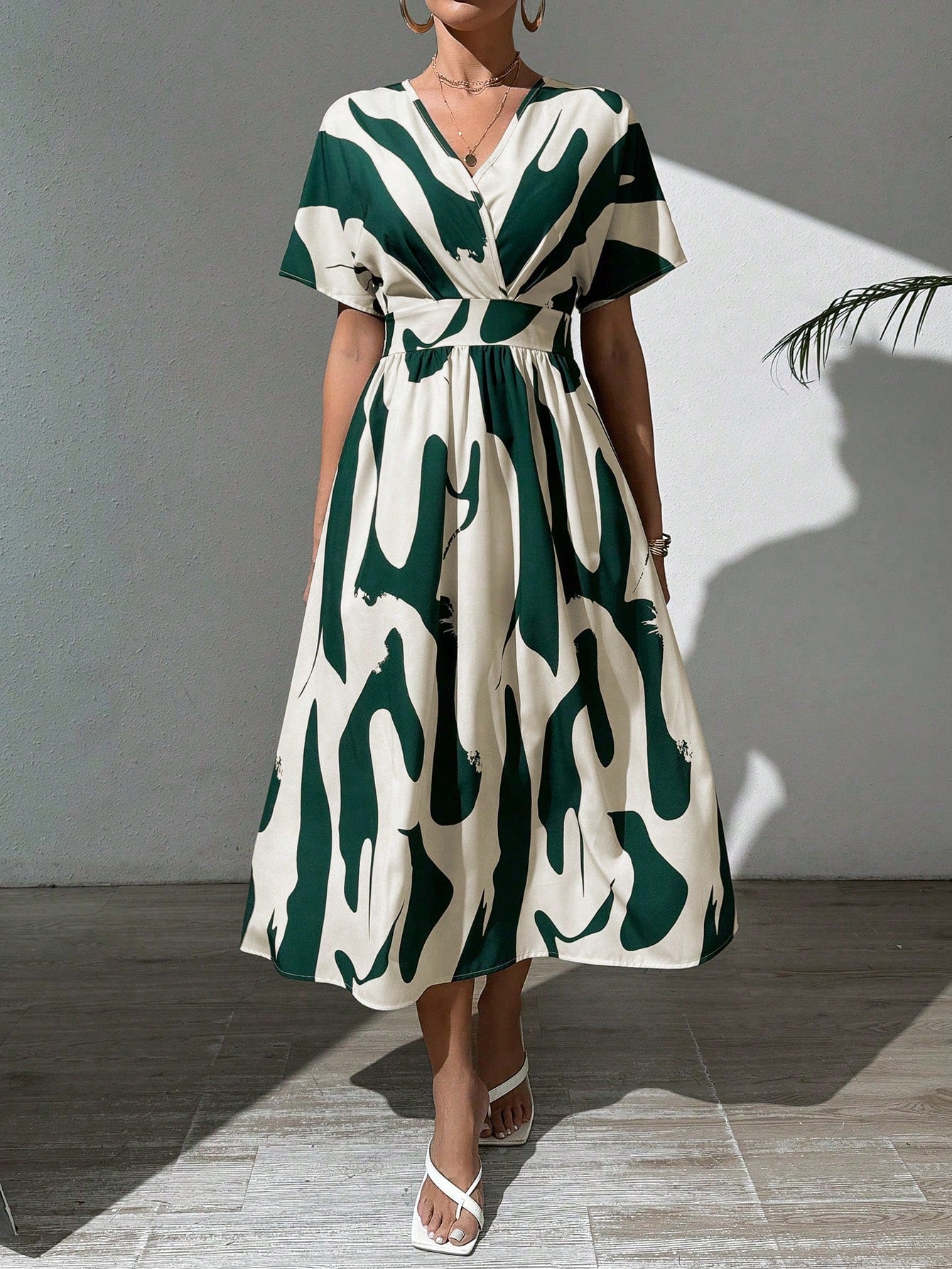 Look effortlessly stylish on your casual holidays with this Chic A-Line V-Neck Maxi Dress, featuring a beautiful floral print. The A-line cut is flattering on any body shape, making it the perfect choice for any occasion. Make it your go-to dress for all your fun summer adventures!