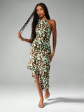 Turn heads this summer with our Chic Abstract Print Halter Neck Maxi Dress, perfect for vacations and beach weddings. Its vibrant abstract design and breezy halter neck create a playful vibe that dances with the ocean breeze. Lightweight and flowy, this dress keeps you cool while making every step feel like a celebration. Embrace effortless style that’s ready for sun-soaked memories and seaside romance.