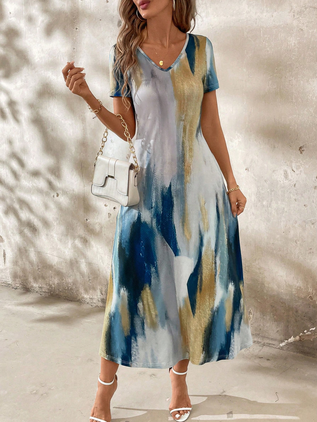Get ready to turn heads and make a statement with our Chic Abstract Tie-Dye Long Knit Dress with Pockets. This dress is the perfect blend of fashion and function, featuring a unique tie-dye pattern and convenient pockets for all your essentials. Say goodbye to boring dresses and hello to a bold and stylish look.
