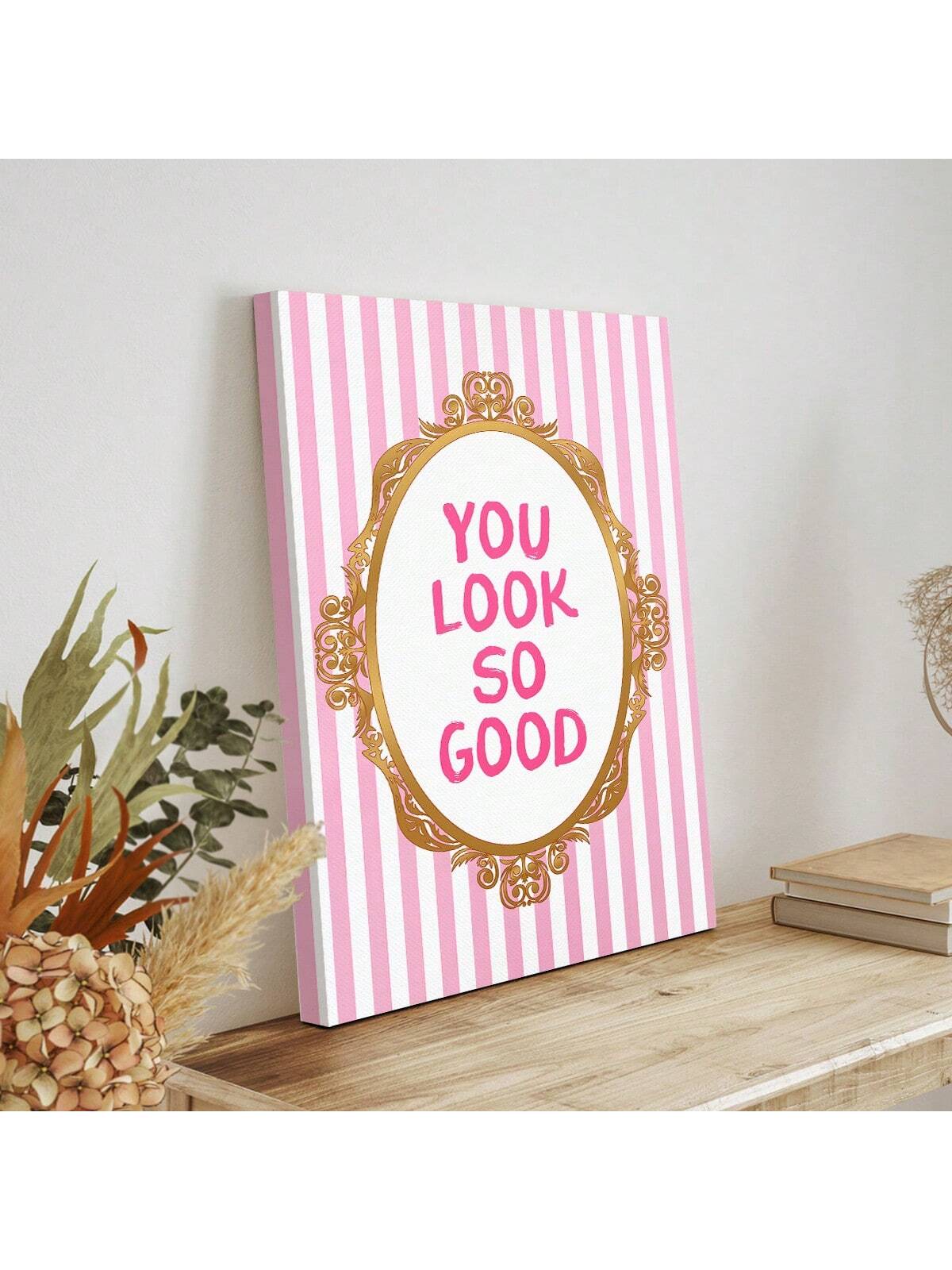 Introduce a touch of style to your living space with our Chic Aesthetic Wall Art. Featuring the phrase 'You Look Good' on a trendy canvas, this piece serves as an effortless way to elevate your dorm or home decor. Made with high-quality materials, it promises long-lasting appeal for your aesthetic needs.