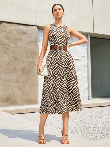 Dress to impress in our Chic Allover Print Sleeveless Dress. Featuring a stylish and effortless design, this dress is perfect for any occasion. The chic allover print adds a touch of glamour while the sleeveless design keeps you cool and comfortable. Elevate your style with this versatile dress.