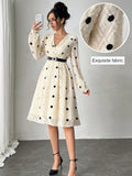 Indulge in this Chic Apricot V-Neck Embroidered Polka Dot Dress for Elegant Women. Strut your stuff in this stunning dress that exudes elegance with its V-neck, embroidered polka dots, and chic apricot color. Perfect for special occasions or when you want to add a touch of sophistication to your wardrobe.