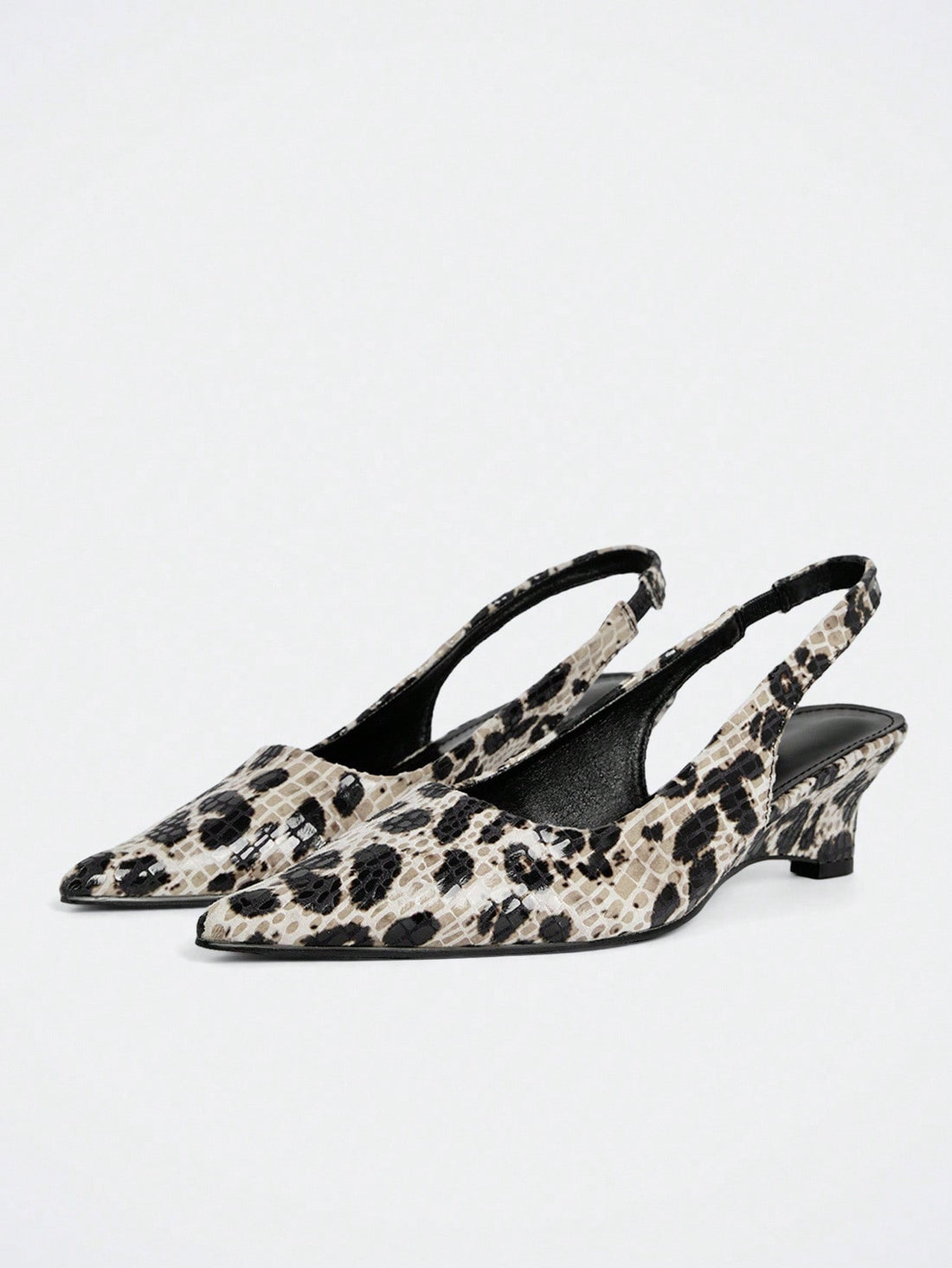 Step into sophistication with these apricot wedge pumps that prove comfort and style aren't mutually exclusive. The gentle wedge heel provides all-day wearability without sacrificing that polished look you're after. Whether you're dressing up for brunch or heading to the office, this warm, versatile shade pairs effortlessly with everything from denim to dresses. The thoughtful design keeps your feet happy while turning heads—because who says you can't have it all?