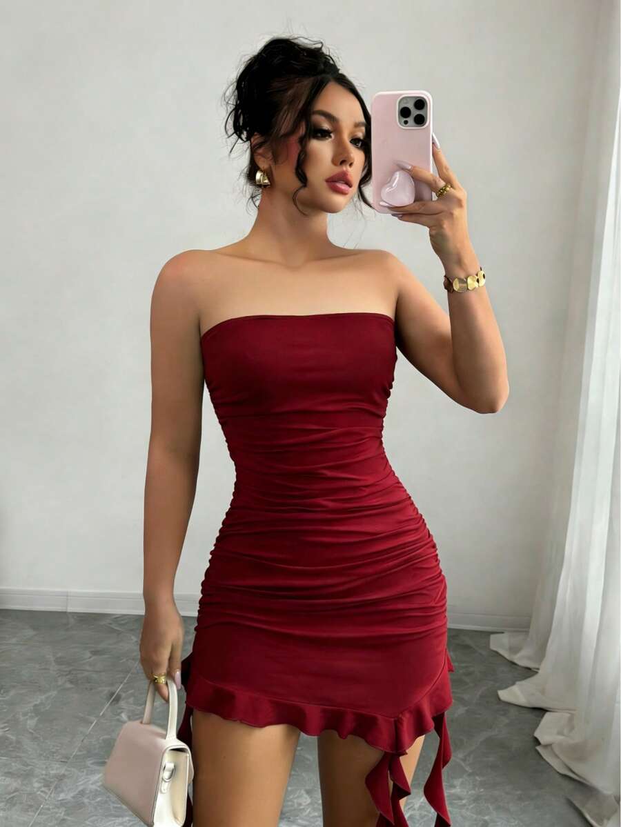 Turn heads this season in our Chic Asymmetric Hem Burgundy Bodycon Dress. This stunning piece features a flattering bodycon silhouette that hugs your curves in all the right places, paired with an eye-catching asymmetric hemline that adds modern edge and movement. Crafted for versatility, this burgundy beauty transitions seamlessly from summer cocktail parties to beachside getaways. 