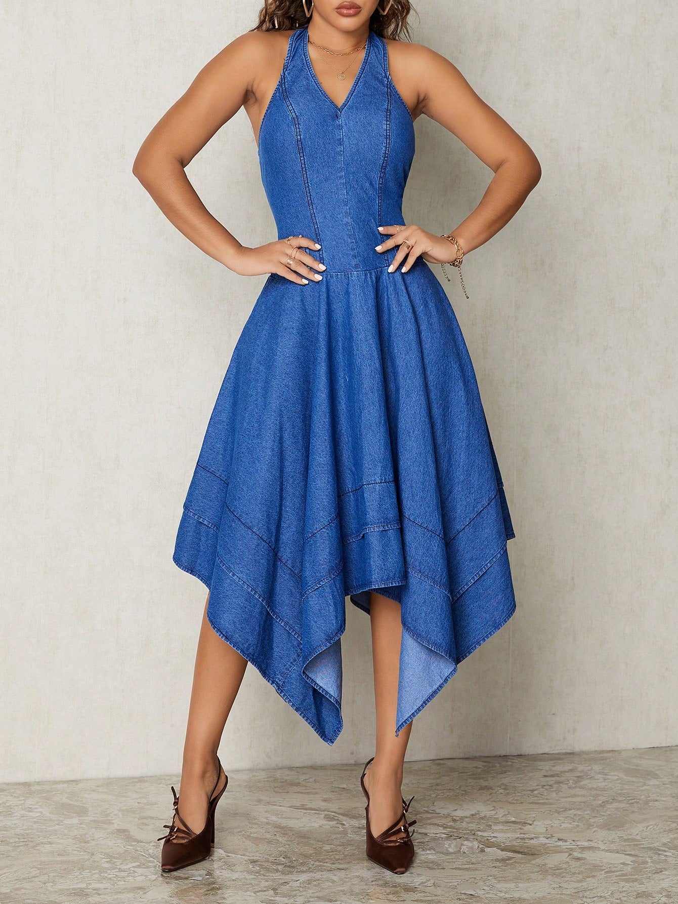 Transform your wardrobe with our Chic Asymmetrical Hem Denim Dress! The perfect combination of style and comfort, this dress will elevate your look for every occasion. Effortlessly make a statement with its asymmetrical hem and embrace your unique sense of fashion. Upgrade your wardrobe with this must-have piece!