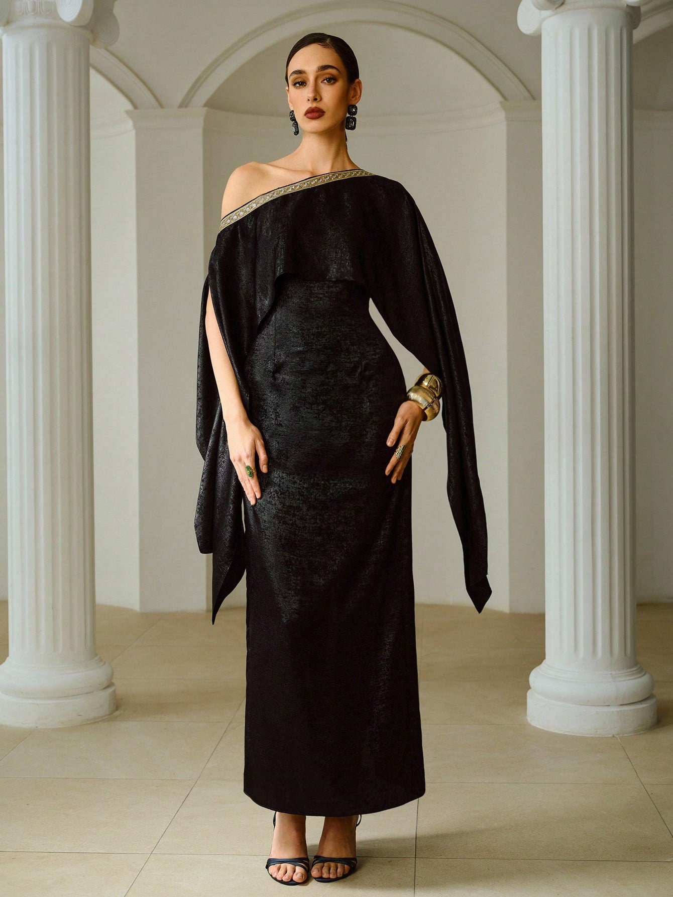 Elevate your formal wardrobe with this sophisticated long dress, designed for those who appreciate refined elegance. The asymmetrical neckline creates a striking silhouette while the delicate ribbon detail adds a touch of understated luxury. A cinched waist flatters your figure and defines your shape beautifully. Perfect for upscale events, galas, and banquets, this dress combines contemporary design with timeless appeal. The flowing length and expert tailoring ensure you'll feel confident and poised throug