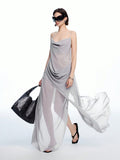 Turn heads this summer with our Chic Asymmetrical Ruffle Neck Long Dress. Featuring a flirty open back and playful ruffles, it’s the perfect choice for warm-weather parties. Lightweight and breezy, this dress combines elegance with a fun twist, making every step feel like a celebration.
