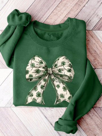 Effortlessly elevate your casual style with our Chic Autumn-Winter Sweatshirt. Featuring a playful clover bow print, this sweatshirt adds a touch of quirkiness to your wardrobe. Stay comfortable and chic all season long. (2 exclamation points)