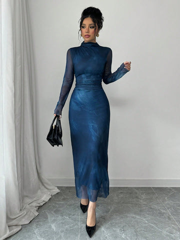 Experience elegance with our Chic Autumn Elegance dress! The pleated waist and slimming design will flatter your figure while the tie-dye pattern adds a touch of uniqueness. The stand collar adds a sophisticated touch to this stylish dress. Perfect for any autumn occasion!