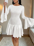 Step out in style with this fitted white bubble dress, designed for effortless autumn charm. Its playful bell sleeves add a touch of flair, perfect for turning heads at both casual outings and cozy gatherings. Flattering and fun, this dress blends comfort with a chic silhouette that makes every day feel special. Embrace the season with a dress that dances with your every move.