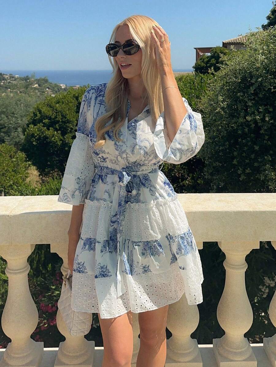 Embrace effortless bohemian style with this enchanting autumn flower print dress. Featuring delicate hollow-out embroidery and a flattering A-line silhouette, it's designed for those who love versatile, eye-catching pieces. The high-waisted cut, bishop sleeves, and layered ruffle hem create a romantic, flowing look perfect for casual outings, holiday gatherings, or campus days. The V-neckline adds a touch of elegance, while the included belt lets you customize your fit. Crafted from a comfortable woven poly