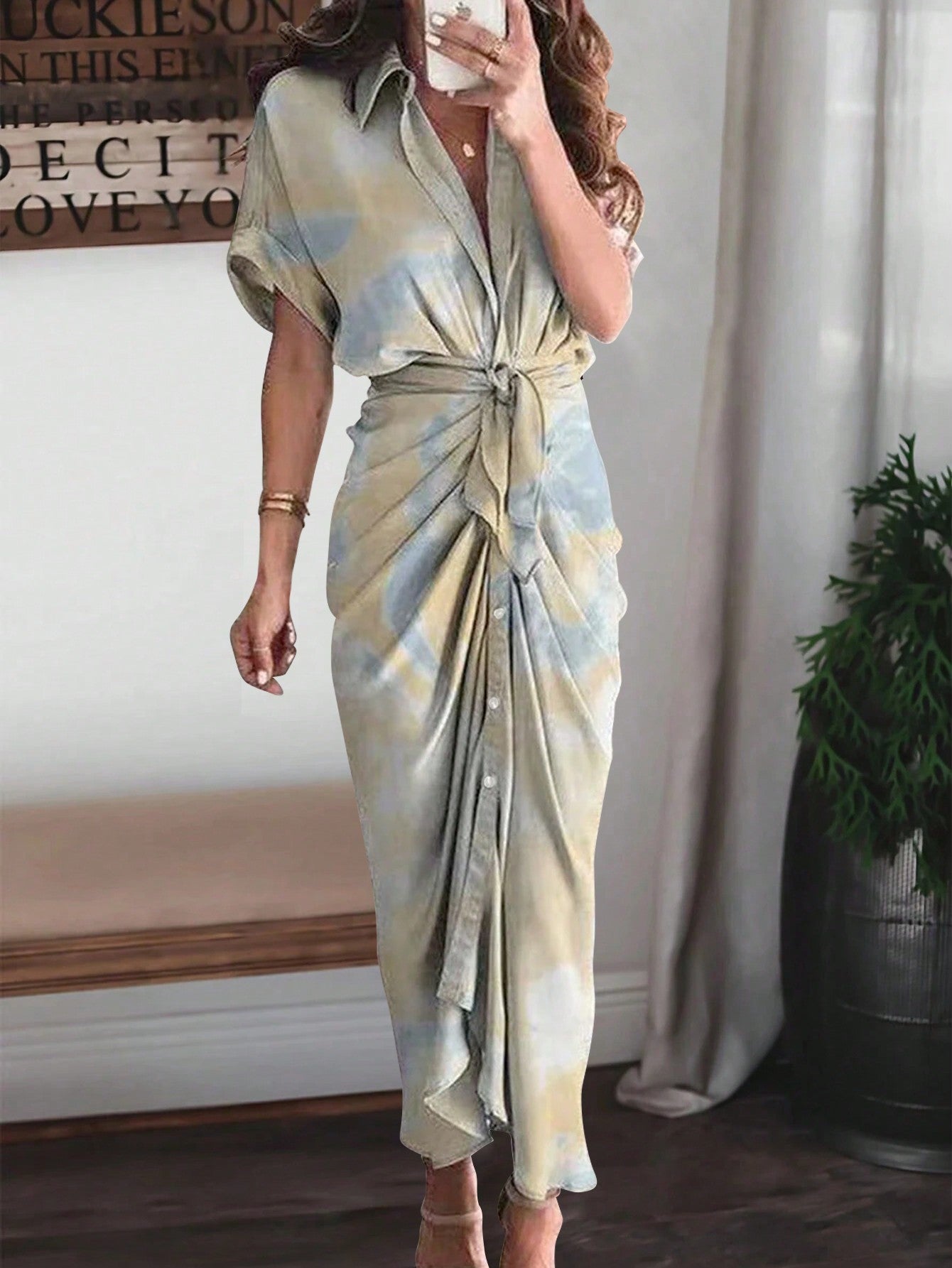 Add some flair to your wardrobe with our Chic Autumn Teacher Dress. The batwing sleeves add a stylish touch while the ruched maxi design offers both comfort and elegance. With a playful tie-dye pattern, this dress is perfect for any occasion (or just for a day in the classroom)!