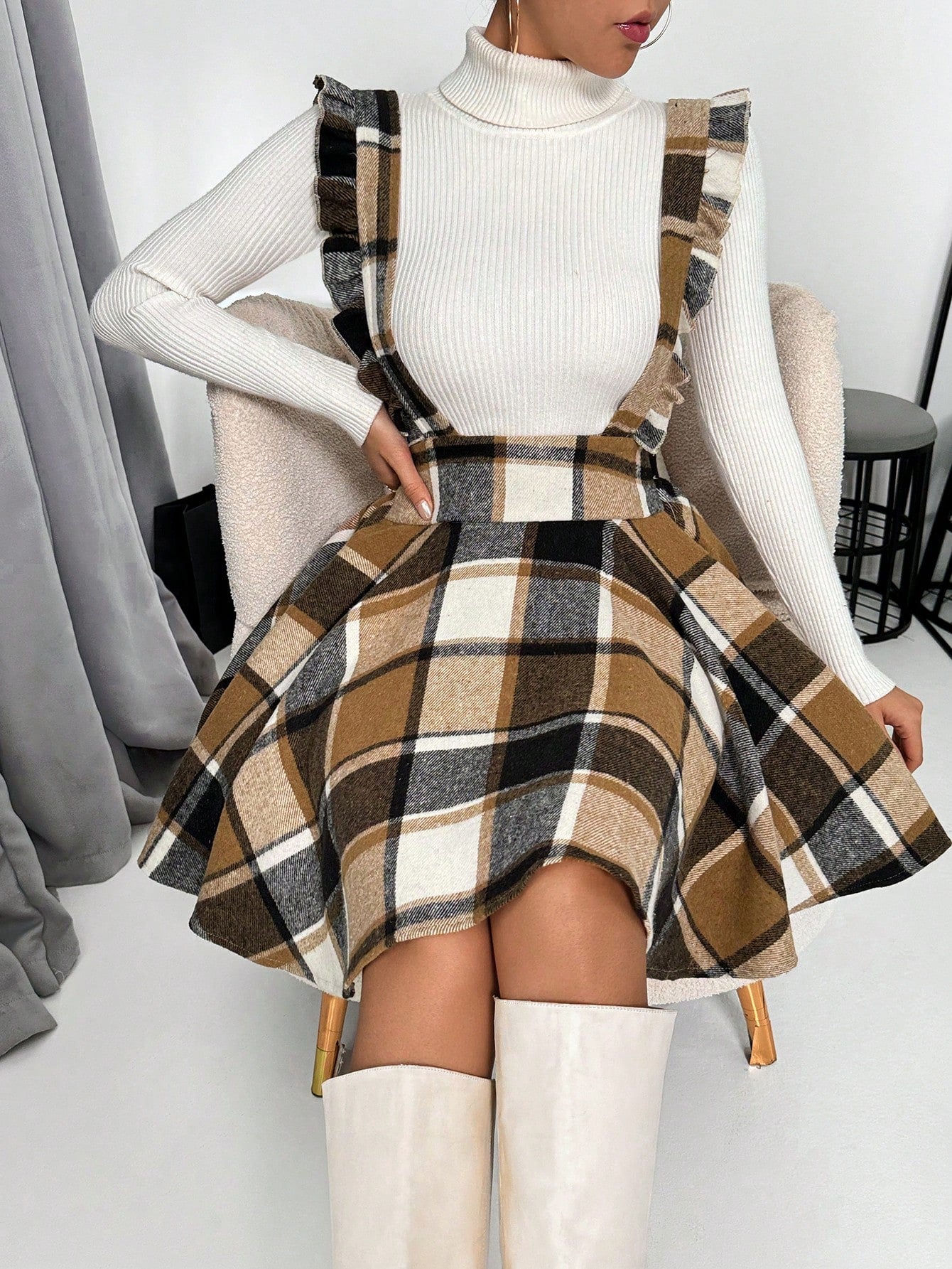 Get ready to slay in this Chic Autumn &amp; Winter Plaid Mini Dress! Perfect for cooler temperatures, this dress features elegant ruffle trims that add a touch of sophistication to the classic plaid design. You'll look stylish and stay warm all season long. (Stay boujee with this Chic Mini Dress!)