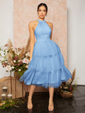 This Chic Baby Blue Ruffle Hem Halter Bridesmaid Dress with Mesh Overlay is a stylish and sophisticated choice for any bridesmaid. The ruffle hem and mesh overlay give it a unique and elegant touch, while the halter neckline adds a flattering and modern twist. Perfect for a chic and fashion-forward bridal party.