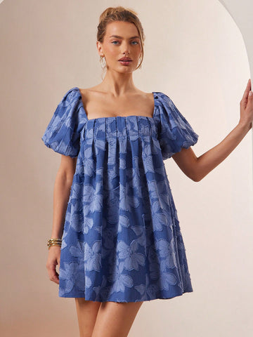 Beachy and breezy, this Chic Backless Floral Puff Sleeve Babydoll Mini Dress is perfect for summer outings. The open back and playful puff sleeves add a touch of whimsy to this flowy dress. Ideal for a day at the beach or strolling along the boardwalk. It's a must-pack for your summer plans.