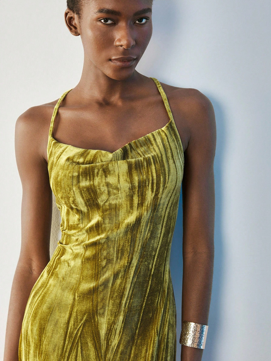 Turn heads at your next party with this chic backless halter midi dress. Its sleek design highlights your shoulders while the midi length adds a touch of elegance—ideal for winter soirées or any stylish event. Feel confident, comfortable, and effortlessly dazzling all night long.