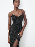Step into the spotlight with this Chic Backless Halter Midi Dress, designed to turn heads at Halloween and every party in between. Its daring backless design combined with a sleek open slit adds a bold, flirty touch that lets you dance and dazzle all night long. Perfect for making unforgettable entrances, this dress blends sexy sophistication with playful charm for an irresistible look.