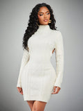 Step into autumn with a flirtatious twist in this chic backless knit dress. Featuring long sleeves and a cozy cable pattern, it’s perfect for those crisp days when you want to stay warm but show off a little unexpected charm. Effortlessly stylish and comfortable, this dress ensures you’re dressed to impress from brunch to bonfire.
