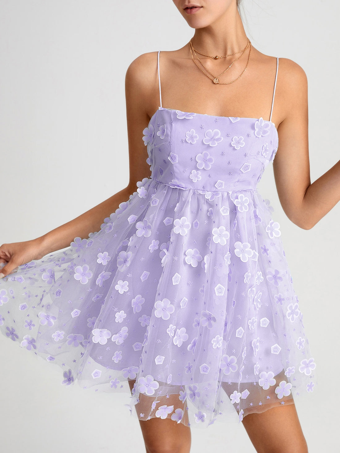 Turn heads in this stunning backless mesh cami dress, where elegance meets edge. The delicate Belle applique detail adds a touch of whimsy and sophistication, while the daring open back design keeps things flirty and fun. Perfect for date nights, parties, or whenever you want to feel absolutely fabulous. The lightweight mesh fabric moves with you, creating an effortlessly chic silhouette that's sure to make a statement. Dress it up with heels or keep it casual—this versatile piece is your new go-to for look