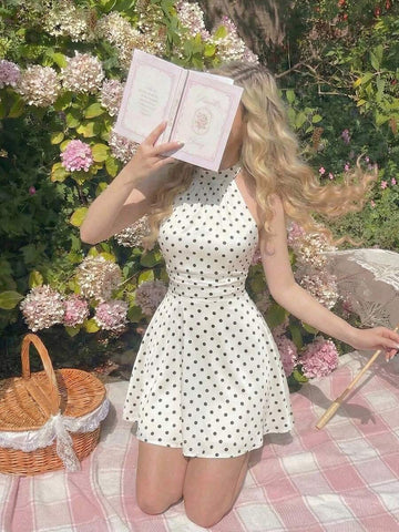 This sophisticated halter mini dress combines modern elegance with timeless appeal. The backless design features a twisted ruched detail that creates flattering dimension, while the halter neckline provides secure support and a refined silhouette. Perfect for fall gatherings, cocktail events, and special occasions, this piece transitions seamlessly from evening celebrations to upscale social functions. The mini length offers contemporary flair, and the strategic ruching enhances your natural curves. Crafted