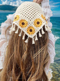 Elevate your accessory game with this chic beige crochet bandana headscarf. Crafted with delicate crochet detailing and finished with charming tassels, it's the perfect blend of style and versatility. Whether you're hitting the gym, enjoying a beach day, or embracing cozy fall and winter looks, this headscarf keeps you looking effortlessly put-together. The breathable crochet design offers comfort for all-day wear, while the neutral beige tone pairs seamlessly with any outfit. 