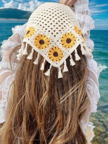 Elevate your accessory game with this chic beige crochet bandana headscarf. Crafted with delicate crochet detailing and finished with charming tassels, it's the perfect blend of style and versatility. Whether you're hitting the gym, enjoying a beach day, or embracing cozy fall and winter looks, this headscarf keeps you looking effortlessly put-together. The breathable crochet design offers comfort for all-day wear, while the neutral beige tone pairs seamlessly with any outfit. 