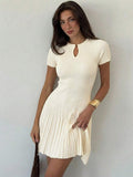 Effortless elegance meets comfort in this chic beige knit A-line dress. The soft, breathable fabric drapes beautifully while the flattering A-line silhouette works for any body type. Perfect for spring and summer adventures—whether you're exploring new destinations, enjoying romantic dates, or dancing through festival season. Layer with a denim jacket for cooler evenings or pair with sandals for a relaxed daytime look. 