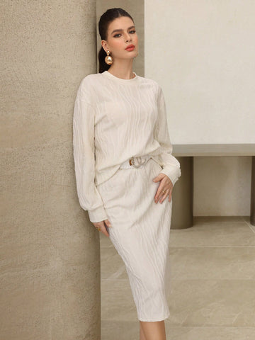 Elevate your everyday wardrobe with this charming beige knitted set that's basically a hug you can wear! The jacquard knit adds visual interest while the long sleeves and crew neck keep things cozy and put-together. Pair the matching skirt for a coordinated look that transitions seamlessly from coffee dates to casual hangouts. It's the kind of set that makes getting dressed feel effortless—no overthinking required. Perfect for anyone who loves looking polished without trying too hard.