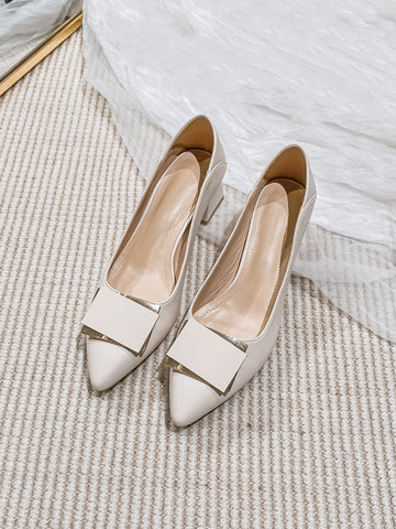 As an industry expert, enjoy these Chic Beige Metal Decor Chunky Heeled Pointed Toe Pumps for a professional, informative look. Made with a unique metal decoration and chunky heel, these pumps provide both style and comfort. Perfect for any formal occasion, these pumps elevate your outfit with their pointed toe design.