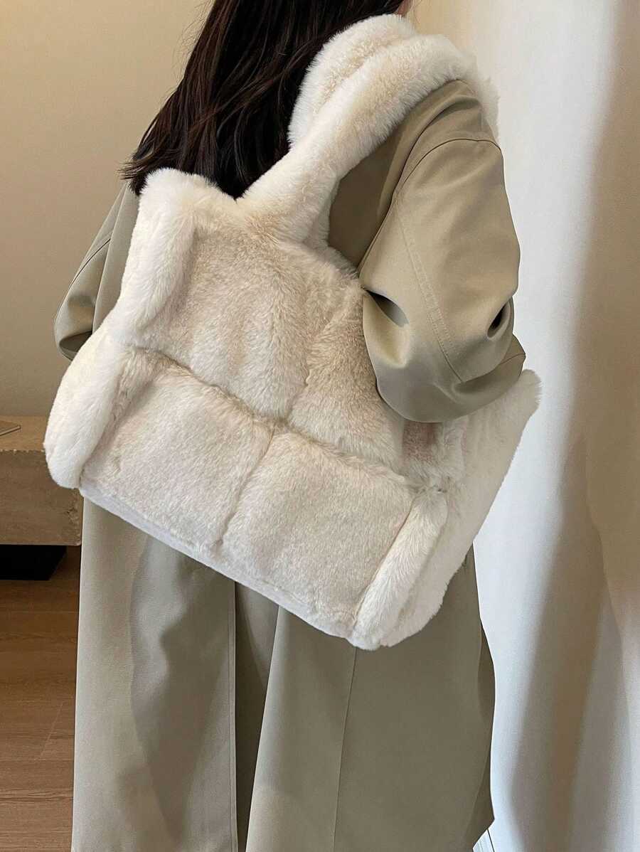 Carry your essentials in style with this dreamy beige plush tote—the perfect companion for everything from coffee runs to campus adventures. Soft to the touch and generously spacious, it's designed for those who love minimalist vibes without sacrificing functionality. Whether you're heading to class, the office, or weekend errands, this shoulder bag keeps your hands free and your look effortlessly chic. The neutral tone pairs with literally any outfit, making it your new go-to for daily adventures.