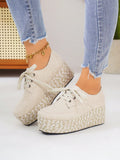 Step up your style game with these chic beige wedge platform shoes! Made from suede material and featuring a lace-up design, these shoes provide both comfort and fashion. With their dual-tone rope soles, they add a unique touch to any outfit. Elevate your look with these expertly-crafted shoes.