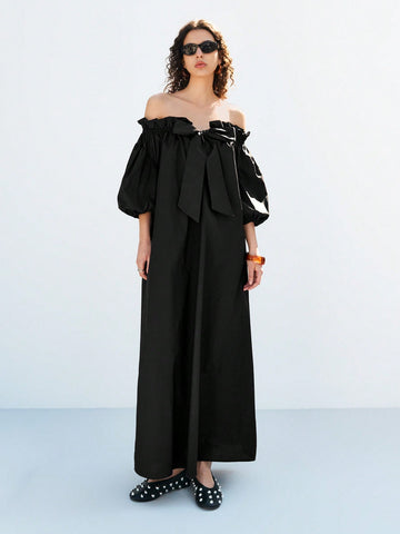 Turn heads this summer with our Chic Black Bow Backless Off-Shoulder Long Dress, designed especially for plus-size fashion lovers. Its playful off-shoulder style and elegant bow detail add a flirty touch, while the backless design keeps you cool and confident on vacation. Perfect for sunny days and warm nights, this dress combines comfort with effortless style.