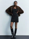 Step out in style with this chic black fitted skirt designed to hug your curves perfectly. Featuring a sleek side zipper for easy wear, this skirt is your go-to piece for turning heads this fall. Playful yet polished, it pairs effortlessly with cozy sweaters or crisp blouses to elevate your seasonal wardrobe. Embrace fall fashion with flair and confidence!