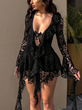 Turn heads at your next summer soirée in this stunning black lace dress. The daring deep V plunge neckline commands attention while delicate lace detailing adds timeless elegance. Flared sleeves create a romantic, feminine silhouette that's perfect for garden parties, cocktail events, or nights out with friends. The sheer lace construction offers breathability for warm weather, making it an ideal choice for season-appropriate style. Whether you're dancing under the stars or mingling at an outdoor gathering,