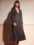 Elevate your autumn wardrobe with this stunning black midi dress that's equal parts sophisticated and fun. The vintage-inspired V-neckline and long sleeves offer timeless elegance, while shimmering metallic polka dots add a playful sparkle that catches the light beautifully. Perfect for dinner dates, cocktail parties, or any occasion calling for effortless chic style. The midi length provides a flattering silhouette that works for any body type, making this dress a versatile go-to piece for the cooler month