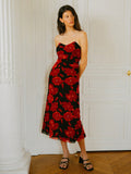 Turn heads in this stunning black midi dress featuring an elegant off-shoulder neckline and captivating red rose print. The flowing silhouette skims your curves beautifully, while the midi length offers sophisticated coverage that works for romantic date nights or wedding celebrations. Pair it with heels and statement jewelry for an unforgettable look that balances timeless elegance with modern flair. This versatile piece is your go-to for any occasion that calls for a touch of romance and style.