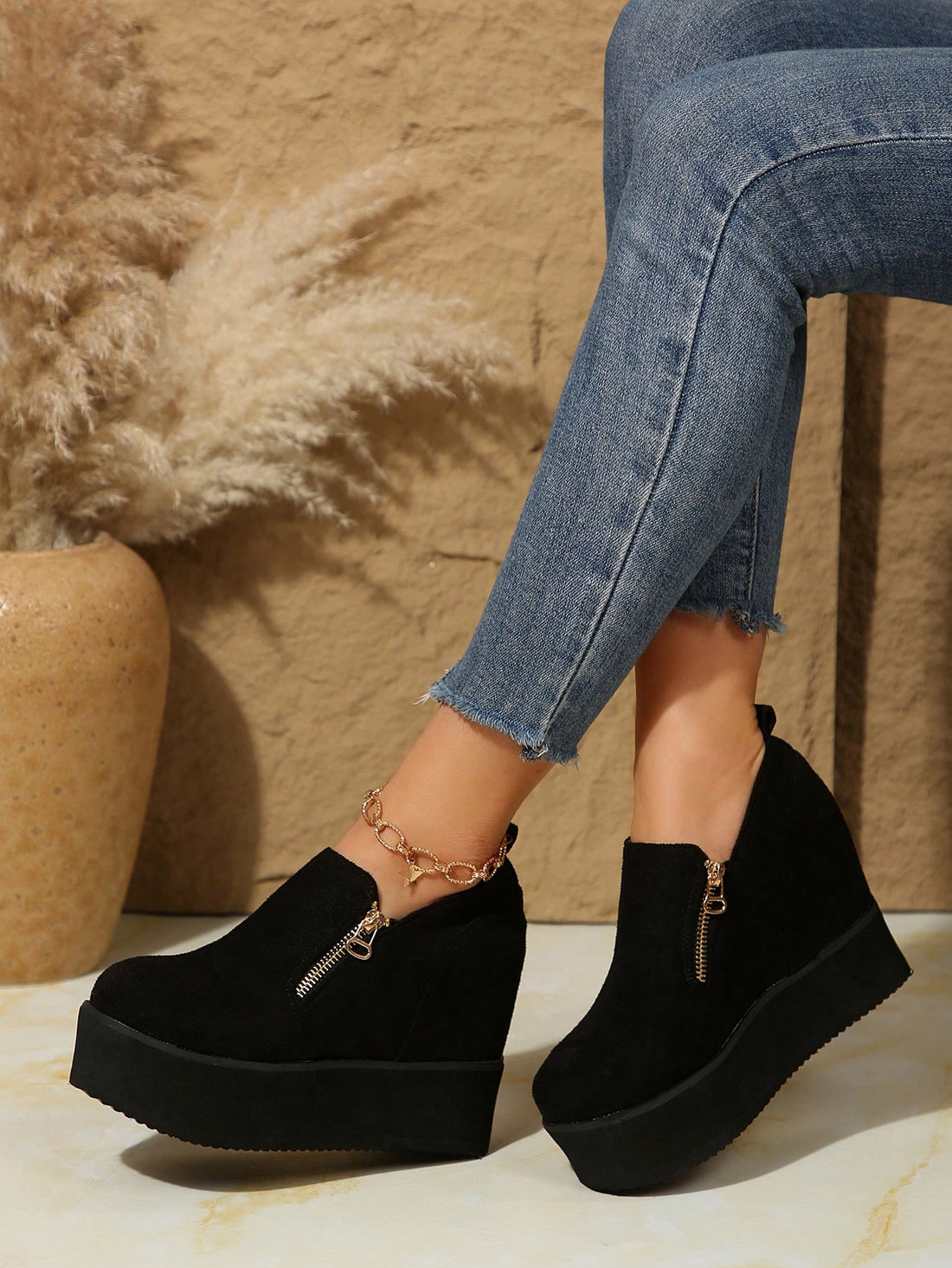 Upgrade your shoe game with these Chic Black Platform Wedge Shoes! Slip into style and comfort with these stylish slip-on heels that will take your outfit to new heights (literally). Perfect for any occasion, these shoes provide the ultimate comfort without sacrificing style.
