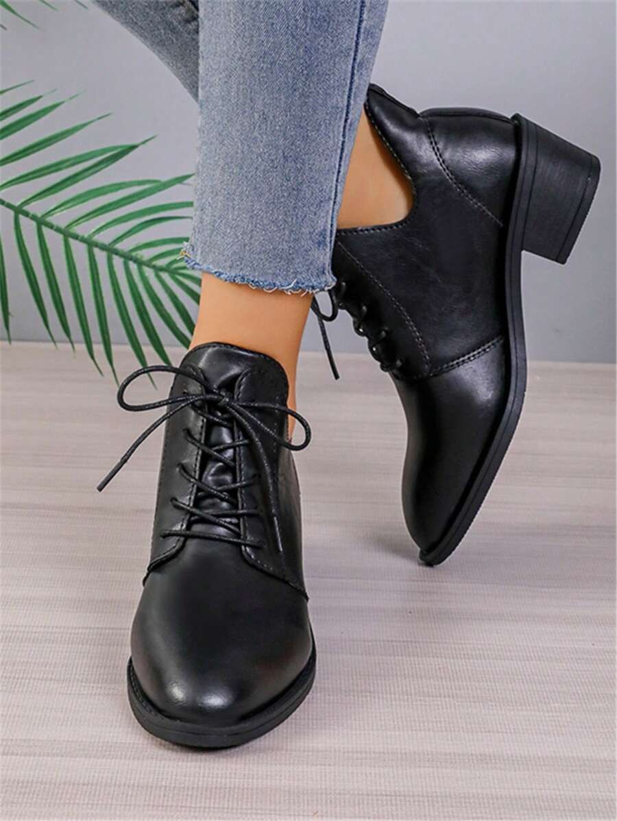 Step into sophistication with these show-stopping black ankle boots that mean business. The sharp pointed toe elongates your silhouette while the chunky heel keeps you grounded and comfortable all day long. Lace-up detailing adds an edgy, rebellious vibe that works just as hard as you do. Perfect for transitioning from spring's fresh vibes to autumn's moody aesthetic, these boots are the versatile wardrobe essential that'll have you feeling like the main character in every room. Dress them up with a little 
