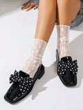 Step up your style game with our Chic Black Polka Dot Bow Loafers. The elegant thick-soled design effortlessly adds flair to any outfit. Slip them on for an instant touch of chicness.