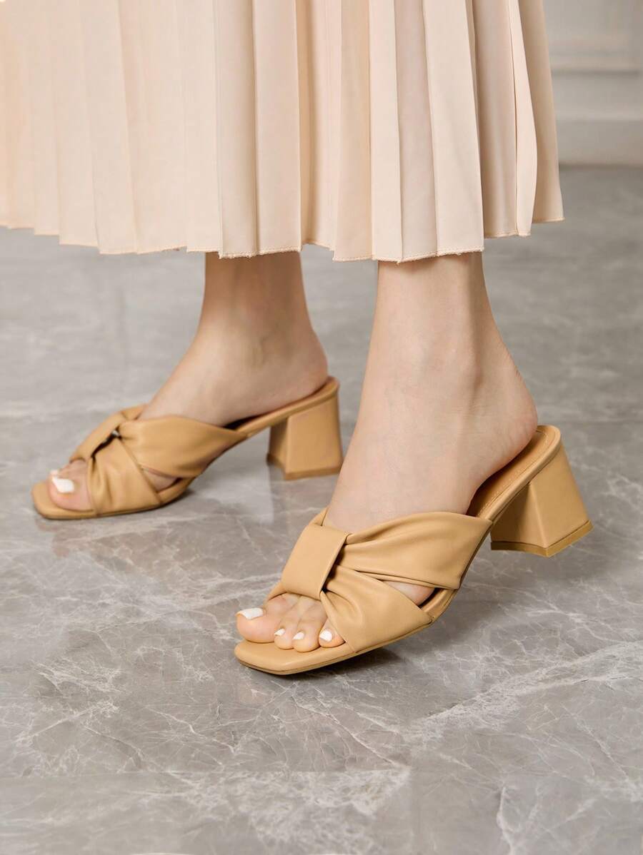 Step into the spotlight with these Chic Black Rhinestone Chunky Heeled Mules! Perfect for summer graduations and prom nights, they combine sparkle and comfort with a sturdy chunky heel that lets you dance the night away. These dazzling mules add just the right amount of glam to your outfit, making every step shine with confidence and fun.