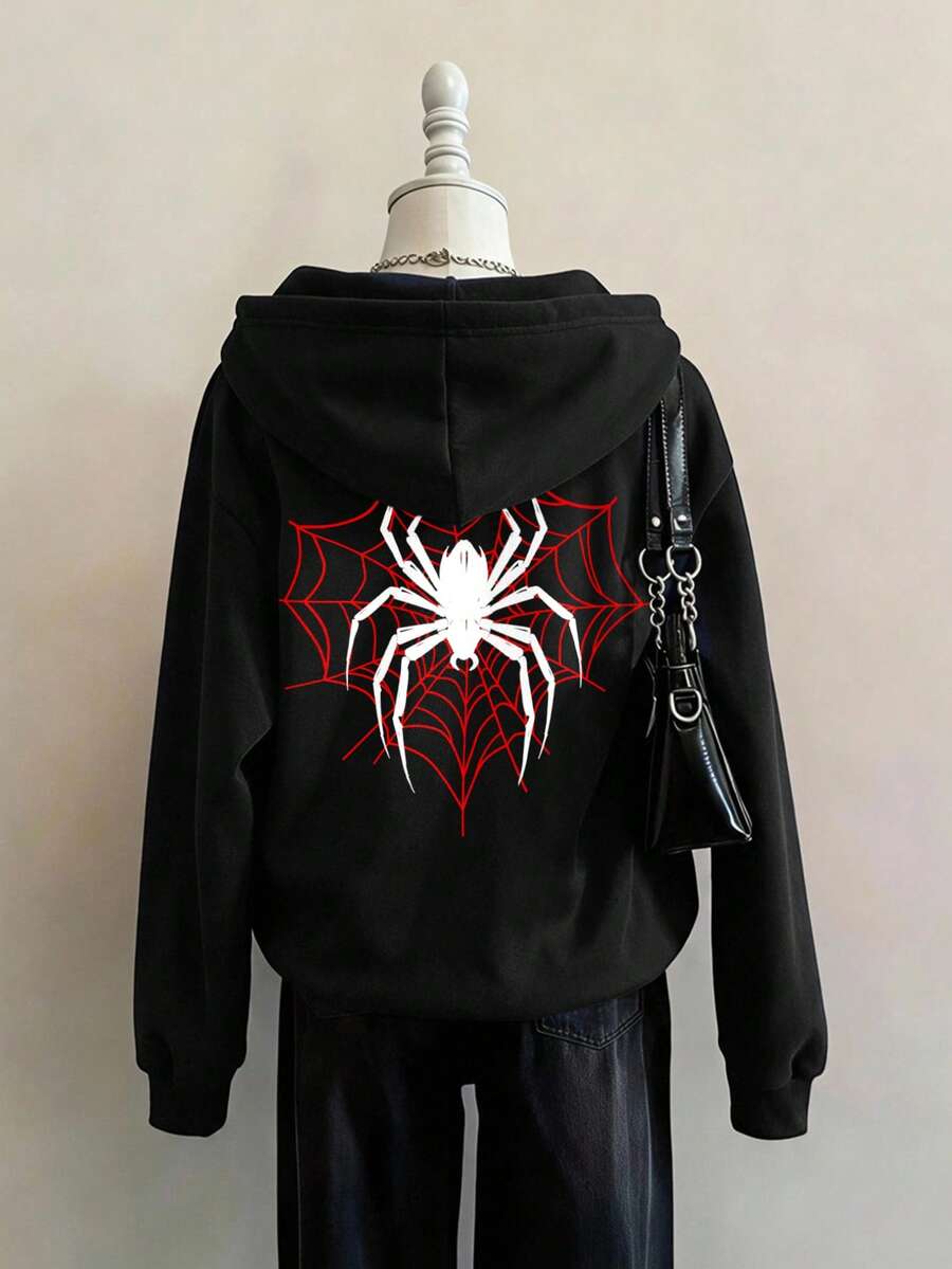 Back view of black zip-up hoodie with large spiderweb graphic
