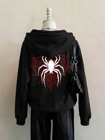 Back view of black zip-up hoodie with large spiderweb graphic